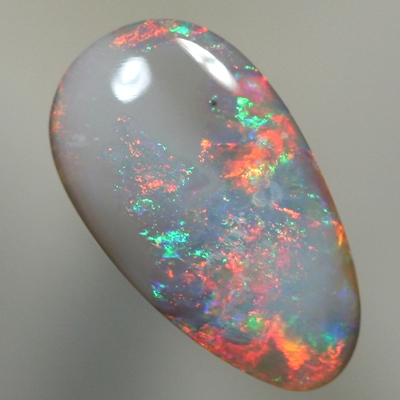 SOLID SEMI BLACK OPAL Bright red fire contrasts with green